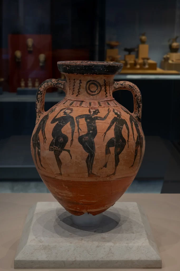 ΑΙΑ.Δ16.00 Μελανόμορφος αμφορέας με παράσταση αυλητή και κωμαστών, α.κ. 11708